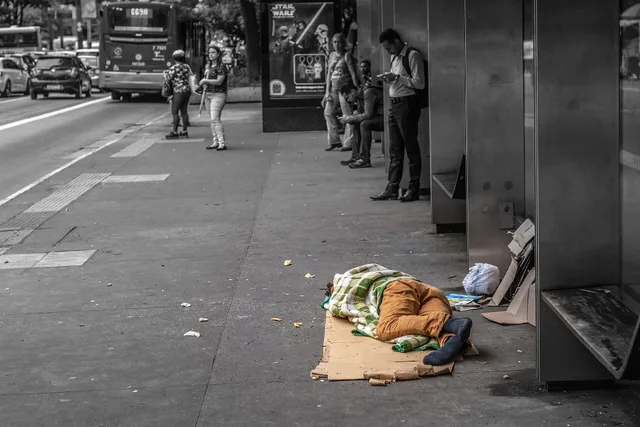 Homeless on Paulista Avenue, São Paulo city, Brazil. Corporate responsibility: what you owe, not just what you give