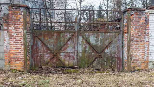 gate, old, passage, factory, thrown, rusty, mess, stalker, ruin, recession, simple, closure, economy, doors, dead end, closed. Why a single plant closure exposes what corporate responsibility means